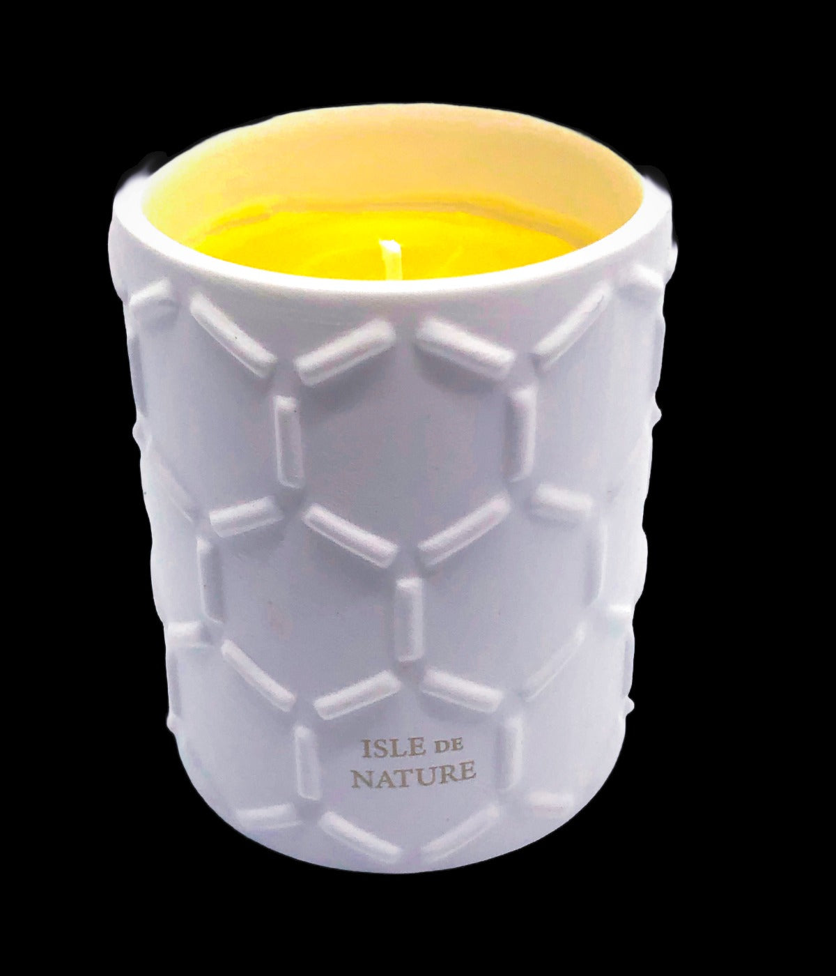 White textured ceramic candle with yellow wax on a black background